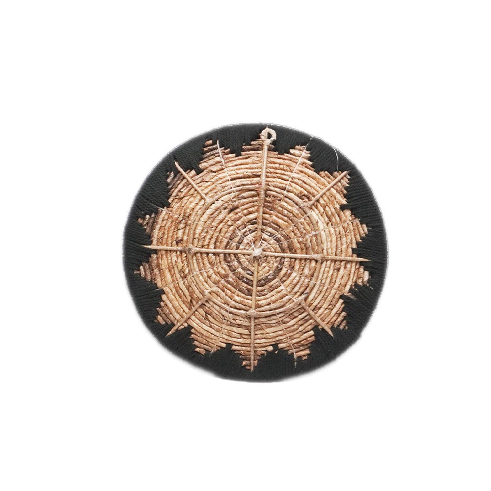 Décoration murale ronde coloris naturel et noir